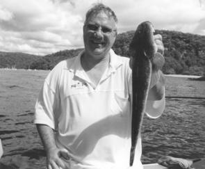 Dave Fox shows off his 50cm flathead that devoured a whitebait on the drift at West Head.